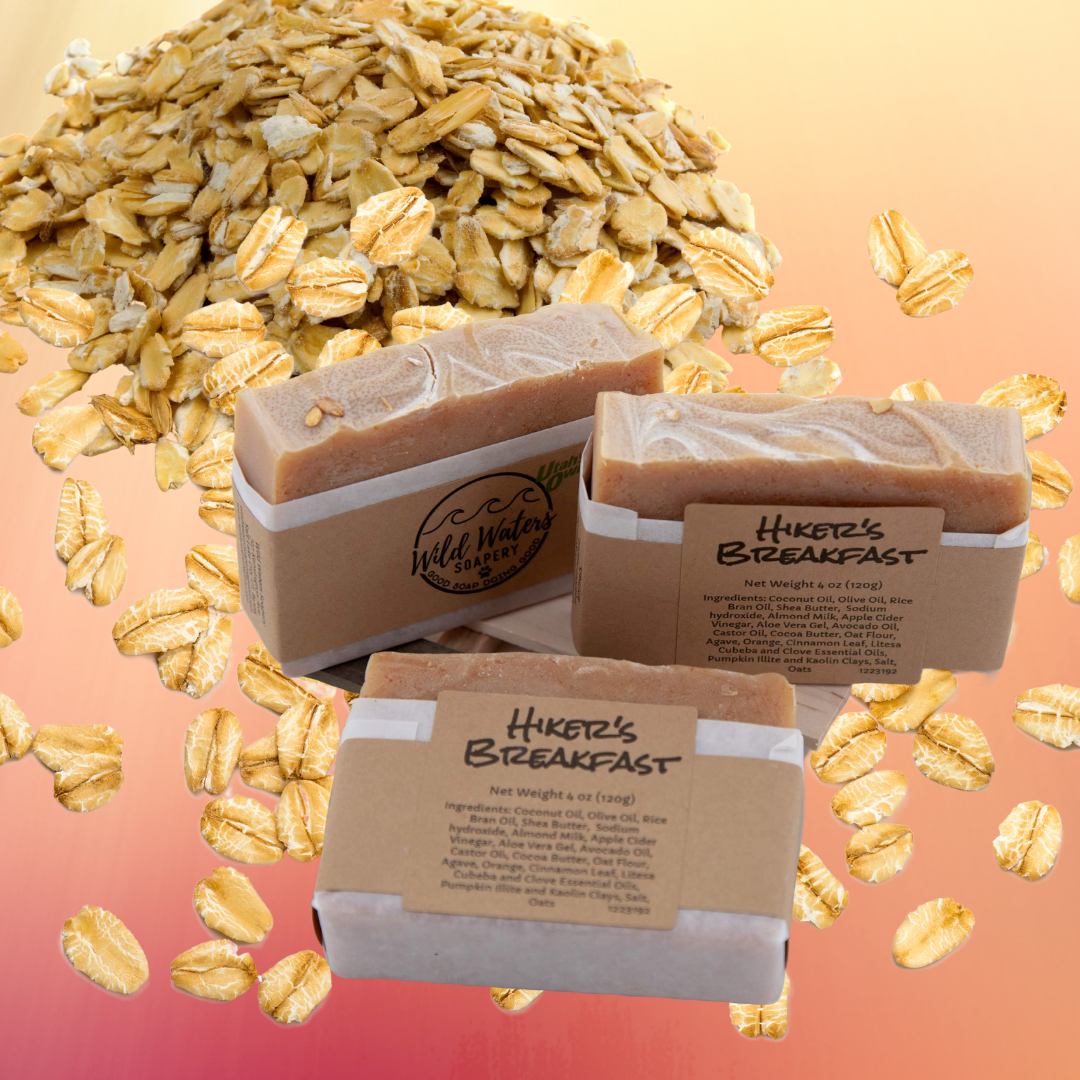 three bars of oatmeal soap in a pile of oats