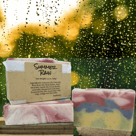 multicolored soap bars in front of a rainy window